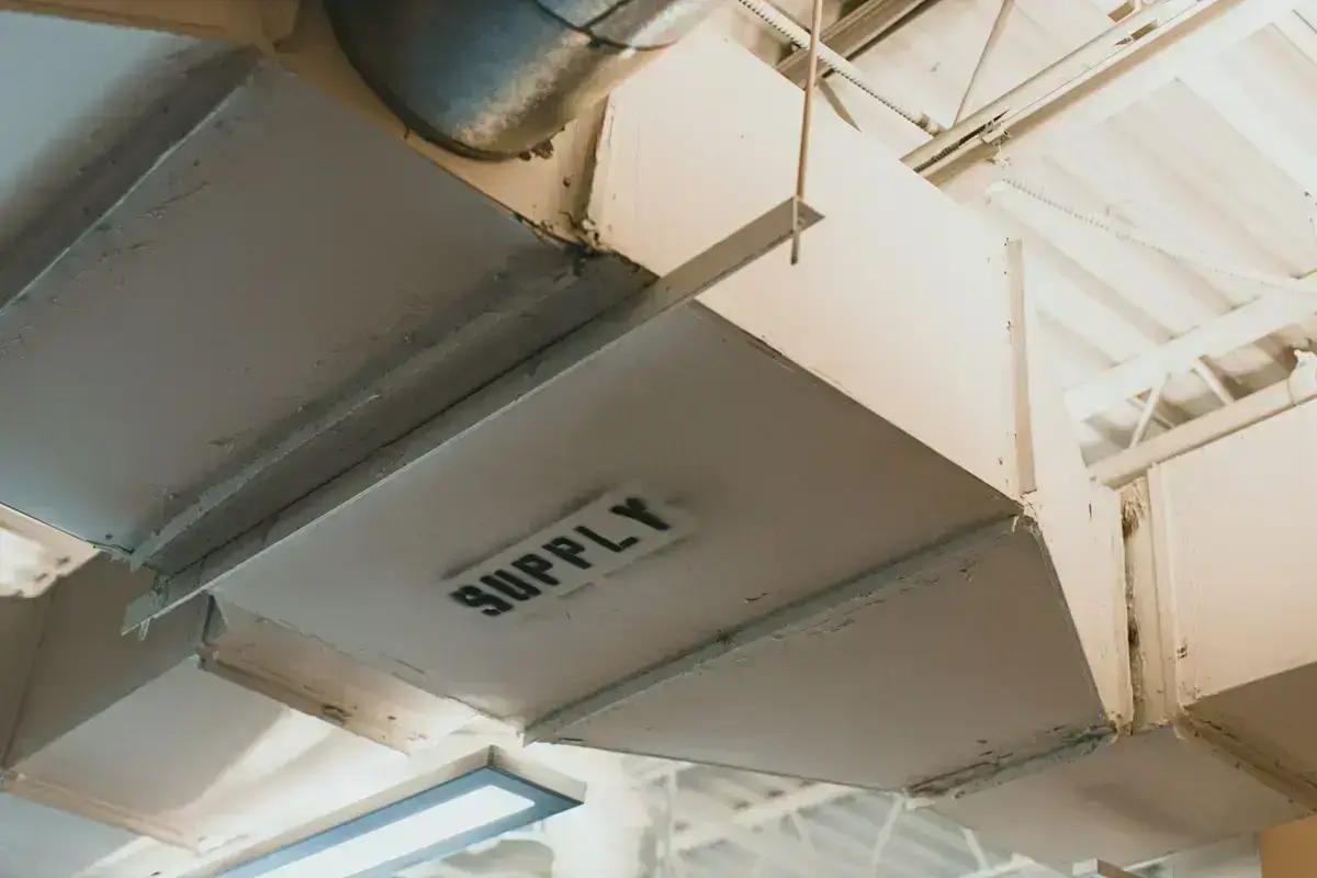 Supply air duct opened during a professional duct-cleaning visit