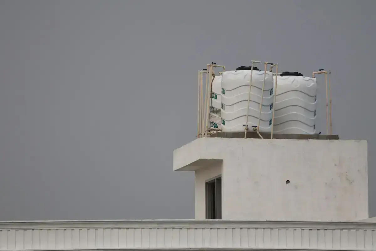 Rooftop water storage tanks ready for drain, scrub and disinfection